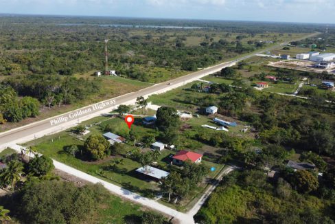 This 0.25 -Acre Lot with Highway Frontage on the Phillip Goldson Highway, Carmelita Village, Orange Walk District, Belize has  great of potential for developement due to its magnificent location on  the Phillip Goldson Highway and close proximity to Orange Walk Town, Belize Just a 5 minute drive from the property, you can reach Schools, Supermarkets, Churches and Parks.  This property measure 150 feet deep  and 75 Feet for Highway Frontage along the Phillip Goldson Highway, Carmelita Village, Orange Walk District, Belize.  This 0.33 Acre Highway Frontage lot offers unlimited possible uses, including small manufacturing, industrial or office warehouse complexes, distribution facilities, mini warehouse, Storage facility, dream home or Retirement Investment. Enjoy the beauty of Orange Walk and Grab this property now!   Shopping, dining, banking, and entertainment is only a 15 minute drive to downtown Orange Walk Town to the north. Don’t miss the opportunity to own this Prime Piece of Paradise!